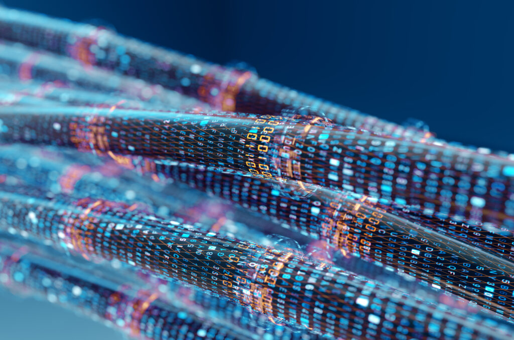 Inneos | The Need for Speed is Driving Fiber Adoption Rendering of fiber optic cables transmitting data/bandwidth with binary code surrounding the cables.