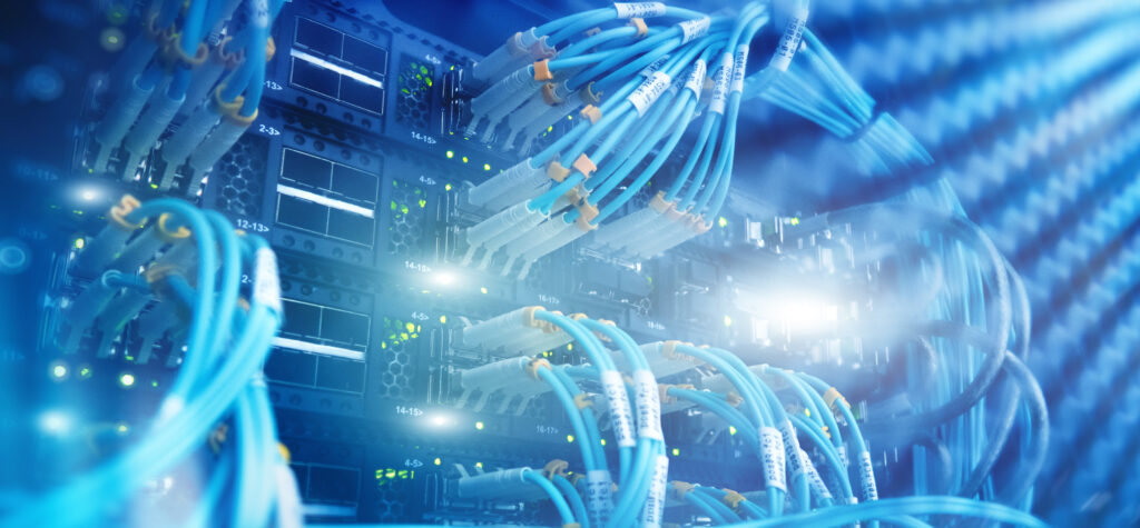 Inneos | What is an Optical Engine? Fiber cables plugged into a network.
